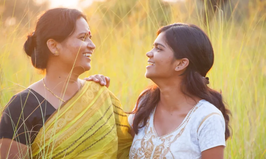 portrait-of-happy-mother-and-daughter-in-meadow-at-2024-09-13-15-49-31-utc