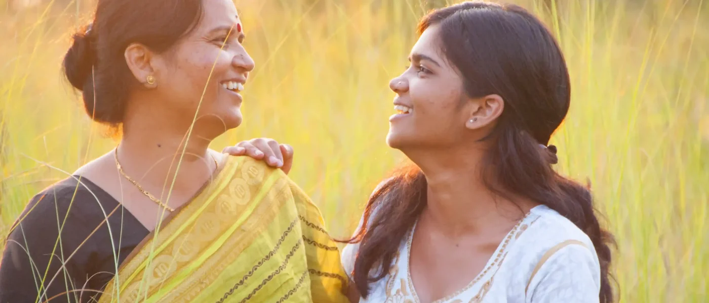 portrait-of-happy-mother-and-daughter-in-meadow-at-2024-09-13-15-49-31-utc